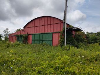 Abandoned Large Metal Building On 1/2 Acre